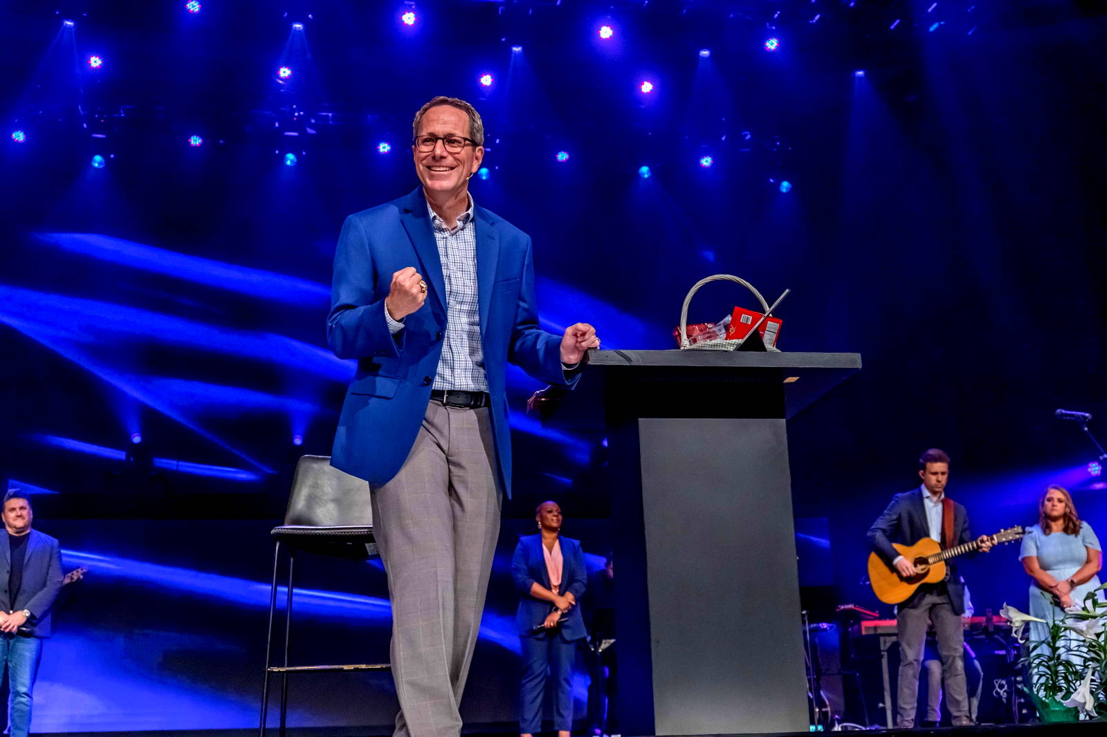 Pastor Greg on stage with the Worship Band