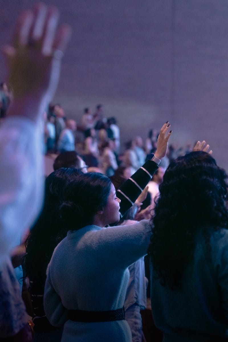 Image of Houston's First attendees worshiping