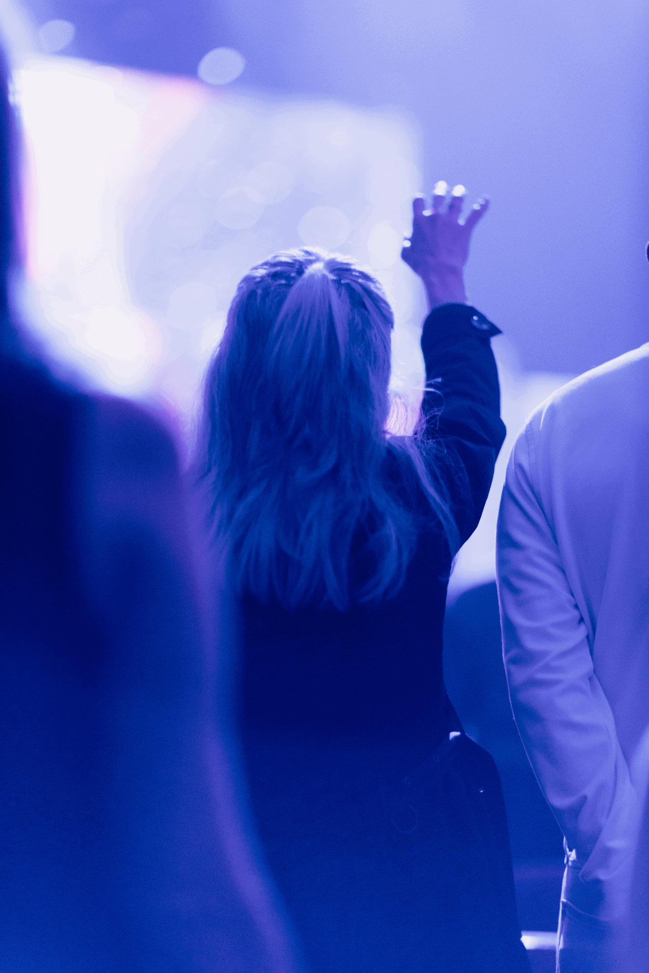 Woman worshipping Jesus at HFBC