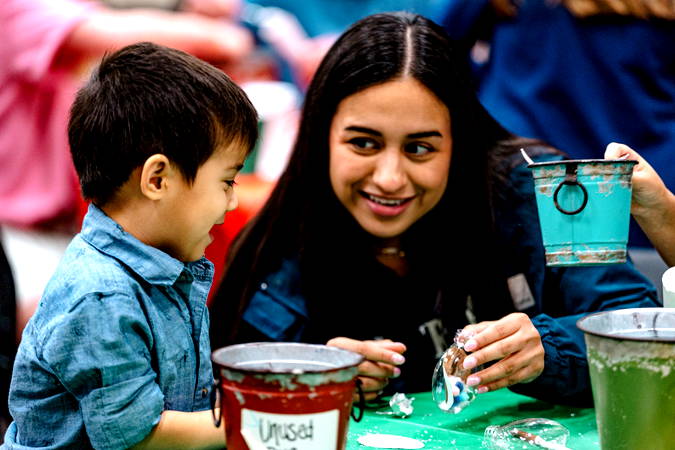 HFBC kids playing with volunteers
